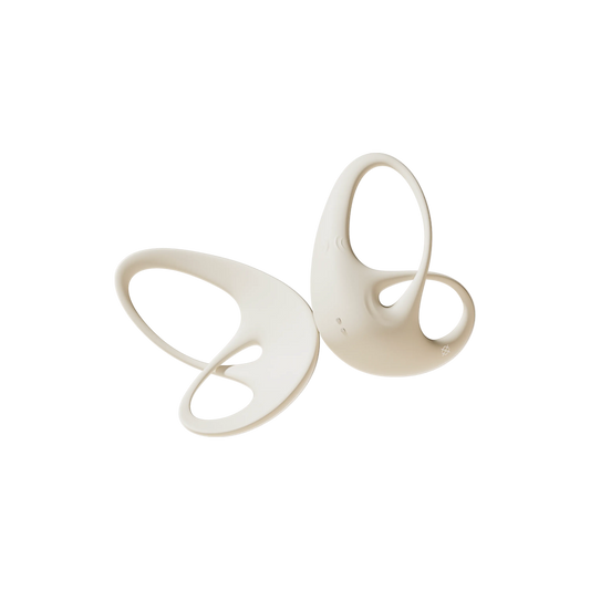 Pair of white silicone nipple vibrators on a white background